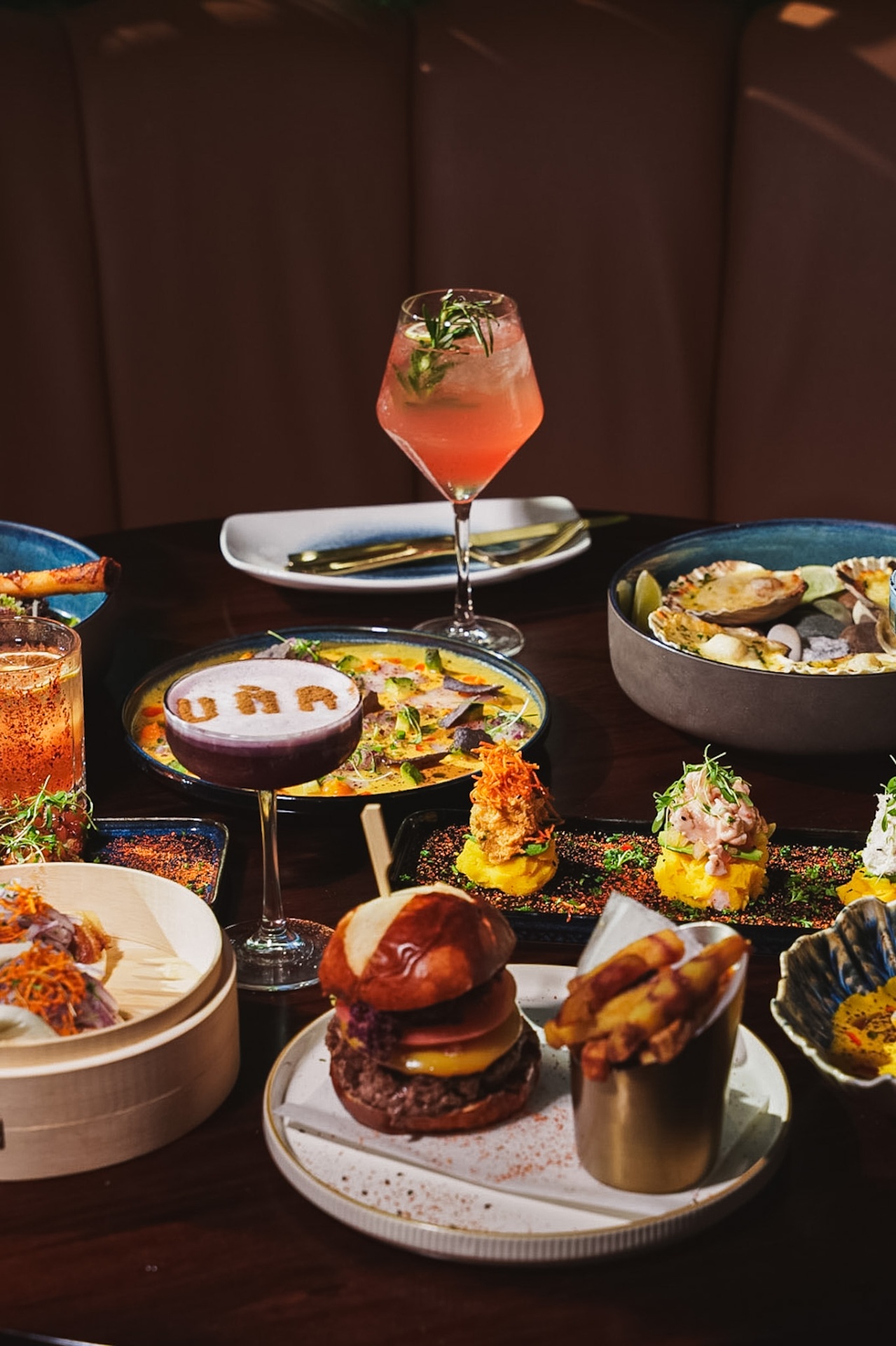 A full UMA table — cocktails, ceviche, anticuchos, causas, and more